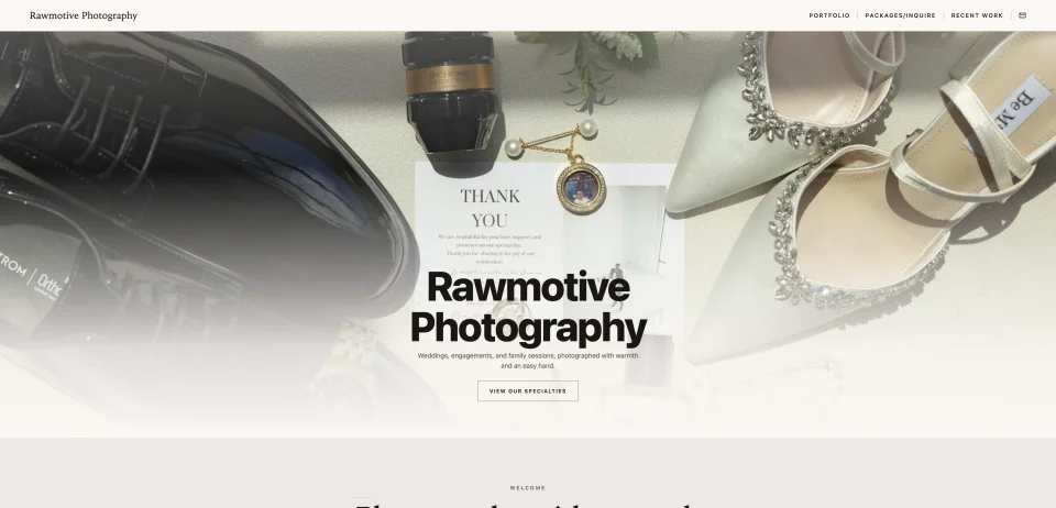 Rawmotive Photography website with a wedding detail photograph and warm editorial styling